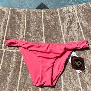 Reversible salmon, colored bikini bottoms, same color on each side Sz M